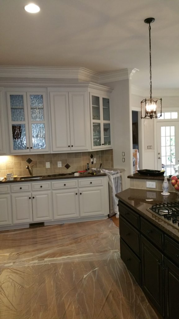 Modern kitchen with freshly painted cabinets and walls by a Painting Company in Indian Land, SC.